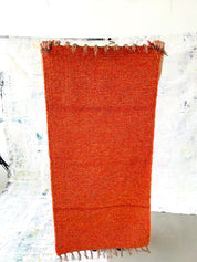 Tapis couleur corail